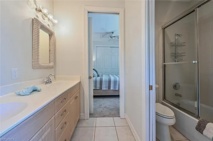 Double sinks separate water closet with Tub and Shower