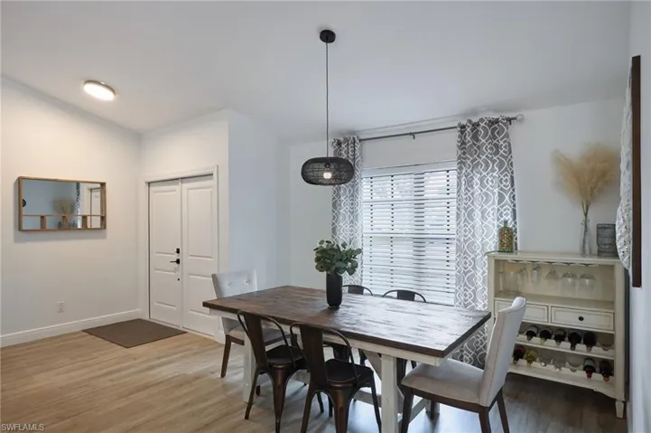 Dining room featuring wood-type flooring