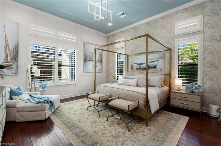 Master Bedroom with ornamental molding, dark wood-style flooring, and recessed lighting