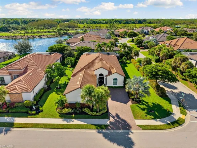 Aerial view of residential area with a nearby body of water