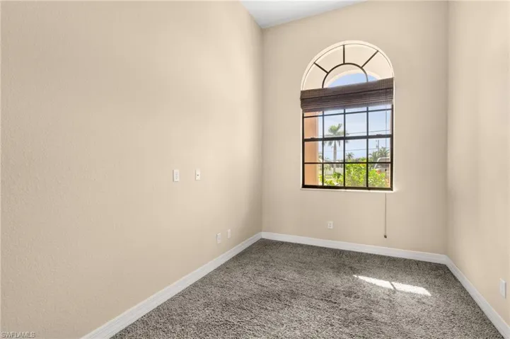 Spare room with carpet floors
