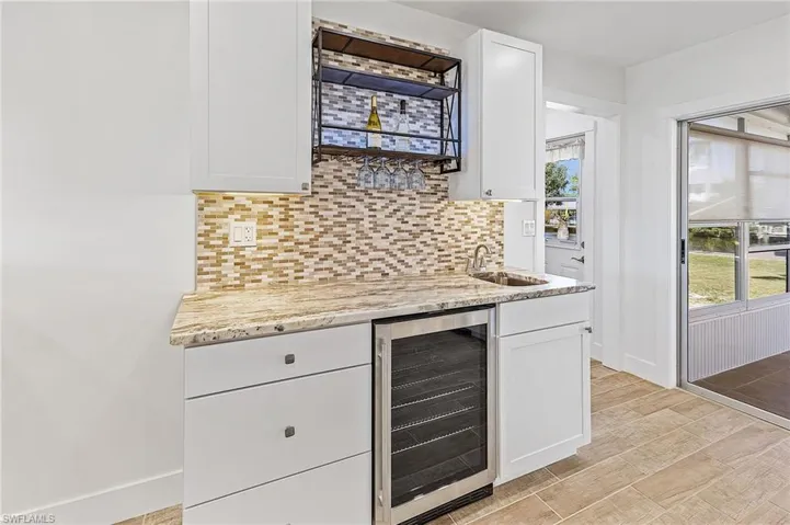 Coffee/Wine bar with sink.
