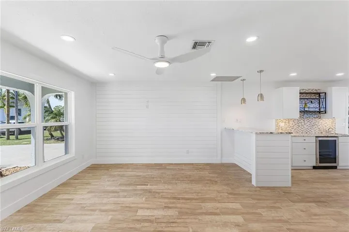 Great Room & Kitchen with built in table.