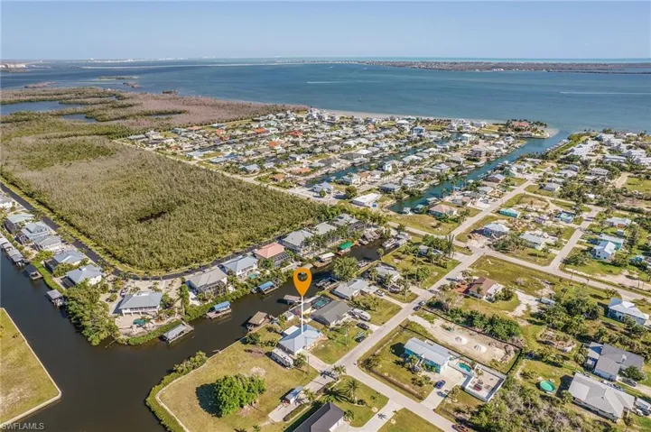 Aerial looking S with Sanibel, Ft. Myers Beach, Bonita Springs and even Naples in the background!  Easy access to the Gulf of Mexico.