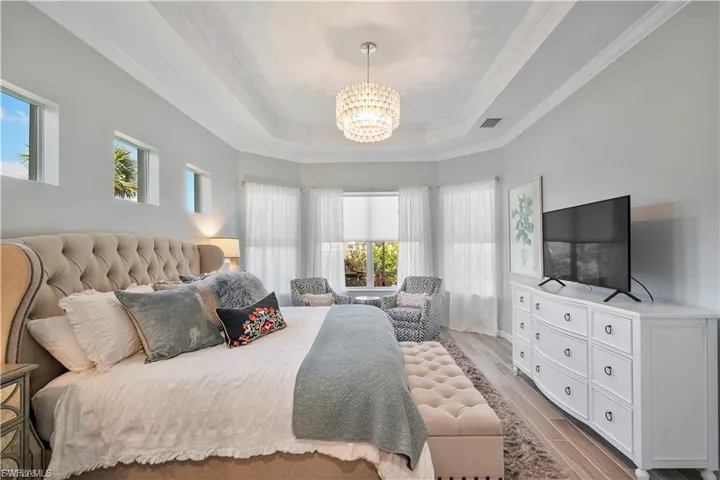 Recessed tray ceiling with a chandelier