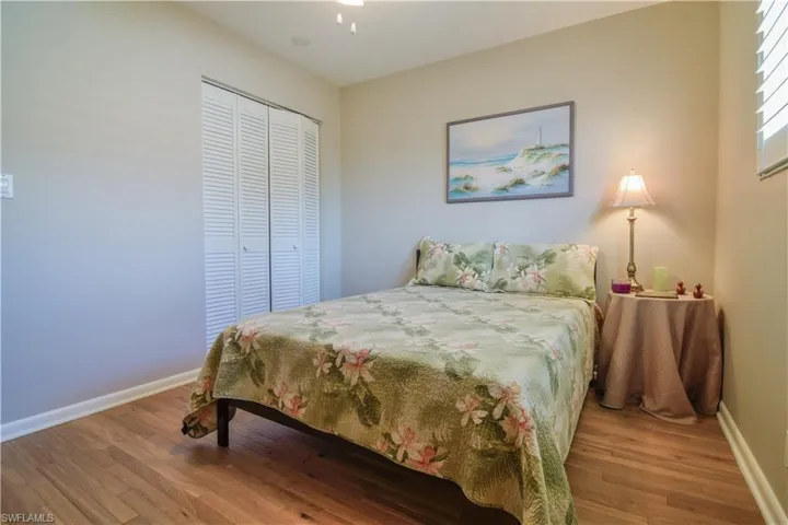 Bedroom featuring a closet and light hardwood / wood-style floors