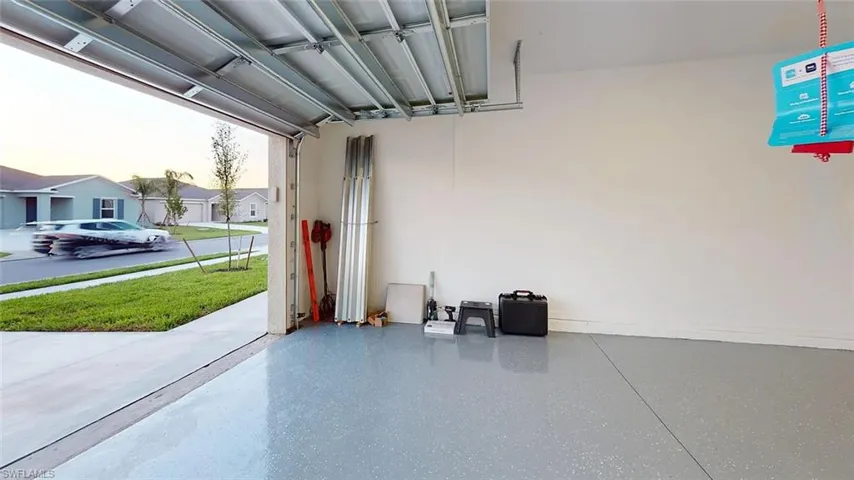 Epoxy-coated garage flooring with painted walls