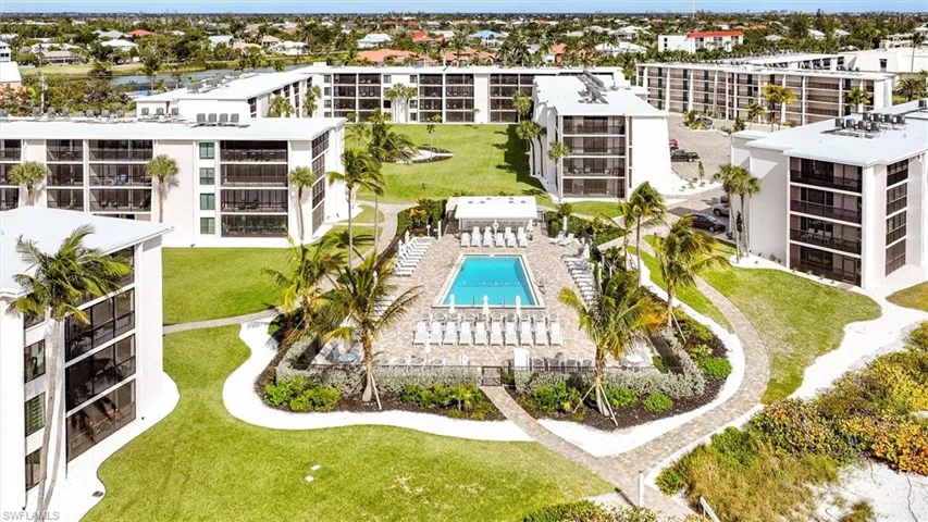 Drone / aerial view of apartment complex / building