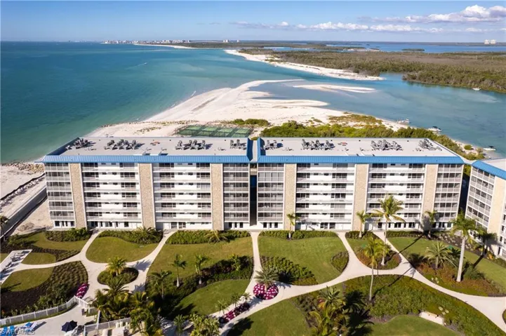 Tropical landscaping in spacious courtyard. "A" building is to the far left-closest to the beach!