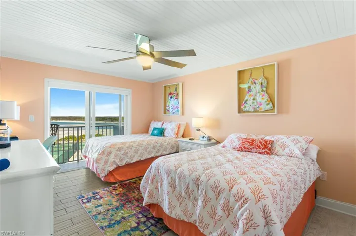 Sliders to the open balcony-which is shared with the Primary Bedroom.