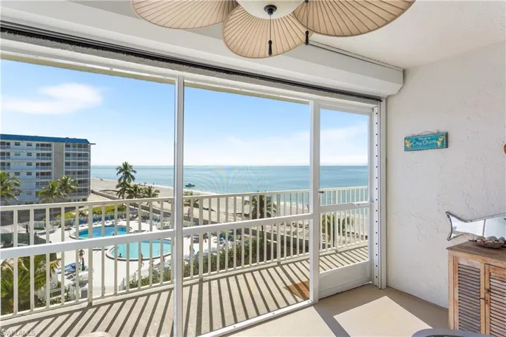 Front screened balcony-electric shutters-Gulf Views