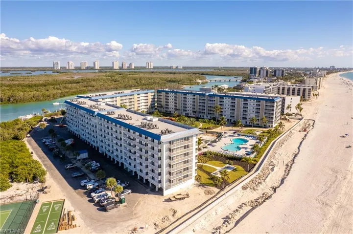 On acres of prime Gulf front property, new beachfront shuffle board and tennis/pickle ball courts!