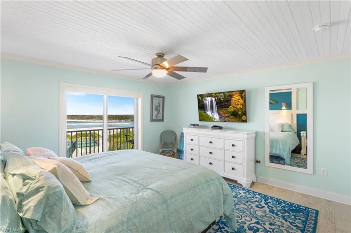 Spacious Primary Bedroom with views of the bay and beach.