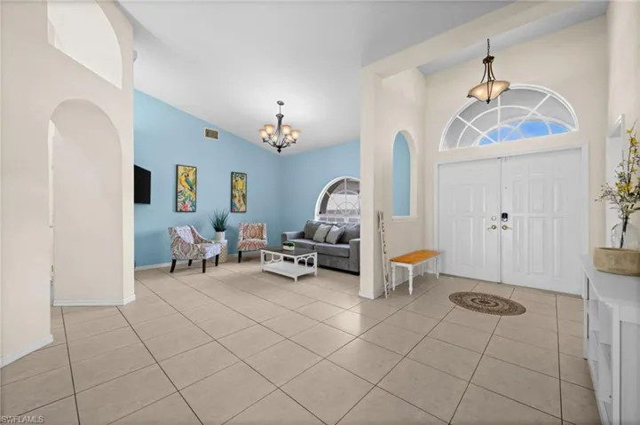 The dining room is currently serving as an additional sitting room.