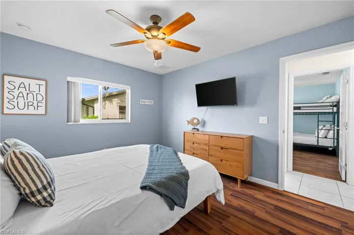 Bedroom No. 2 also enjoys beautiful flooring. A walk-in closet? Of course.