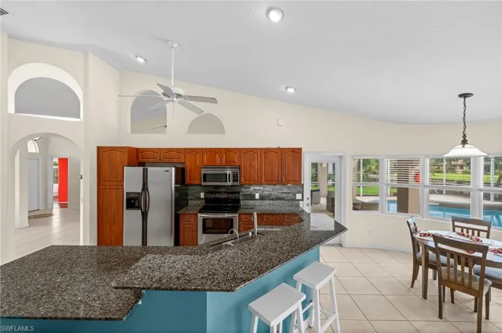 This home features a well thought out floor plan with gorgeous canal front views across the back of the home.