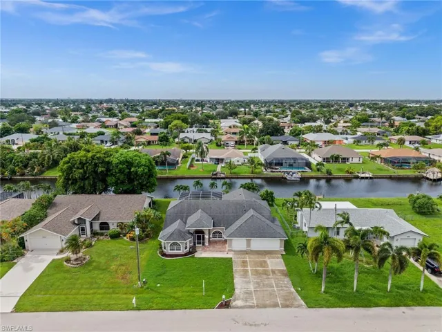 An extended driveway and a 3 car garage.