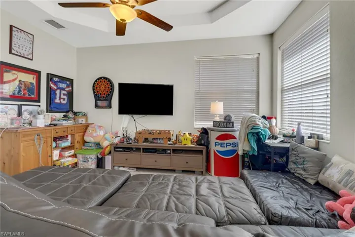 Living room featuring ceiling fan