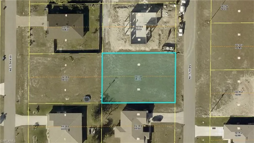 Aerial overview of property's location with property parcel outlined