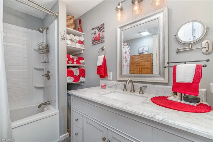 GUEST BATH W/GRANITE TOPPED VANITY, UNDER-MOUNT SINK, COMBO JETTED TUB/SHOWER
