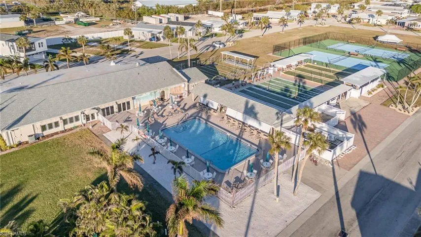 AERIAL VIEW:  CLUBHOUSE; POOL; BOCCE, TENNIS, SHUFFLEBOARD AND PICKLEBALL COURTS