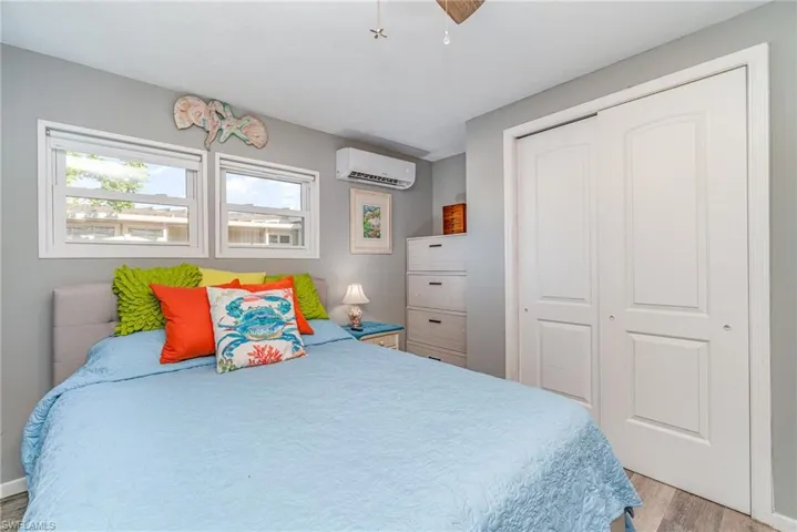 GUEST BEDROOM W/EASTERN EXPOSURE WINDOWS.  REACH-IN CLOSET.