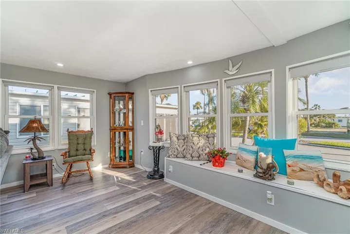 EAST, SOUTH AND WEST FACING WINDOWS IN THIS AREA.  BUILT-IN STORAGE UNDER BAY WINDOW.