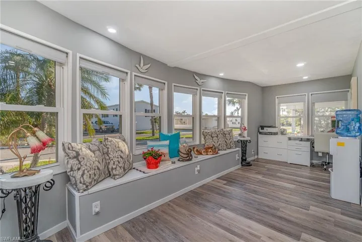 SOUTH AND WEST FACING IMPACT RESISTANT WINDOWS.  RECESSED LIGHTING.