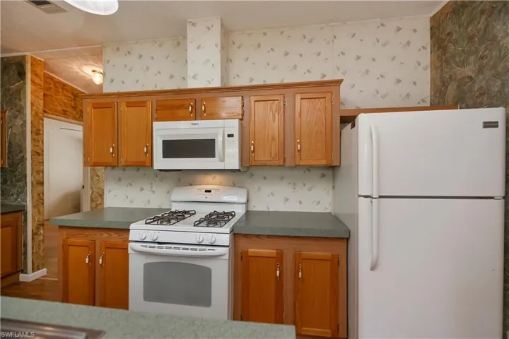 Kitchen with white appliances