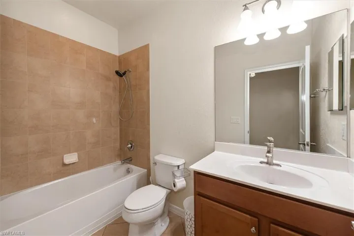 En-suite bathroom serving the private guest bedroom.