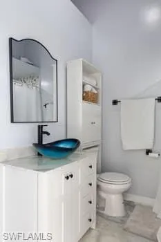 Bathroom with vanity and a shower with curtain