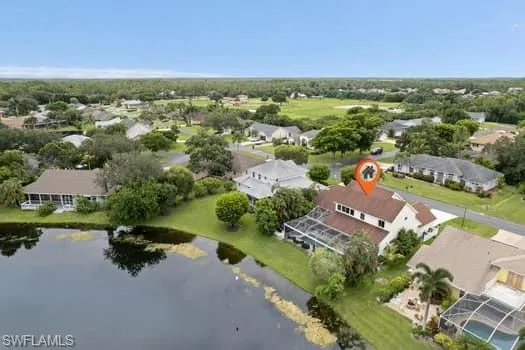 Aerial view of residential area with a nearby body of water