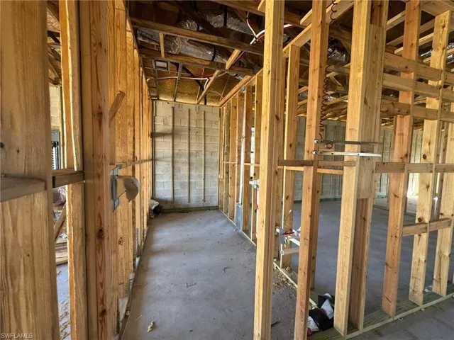 Miscellaneous room with concrete floors