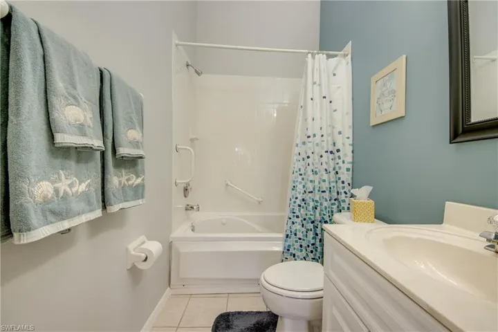 Guest Bath with Whirlpool Spa Tub.  Soak and relax after a day on the golf course!
