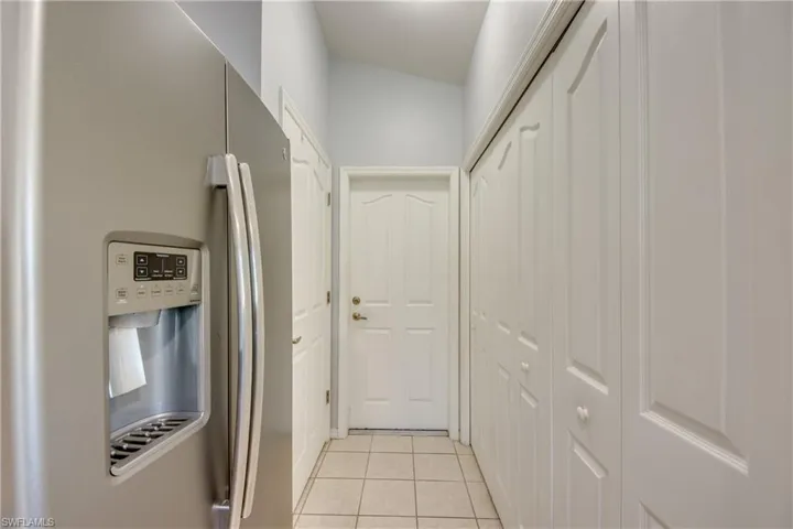 Entry from garage.  Laundry on right. Good size pantry on left.