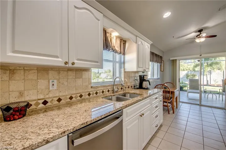 Kitchen sink wall.  Dishwasher 2023.