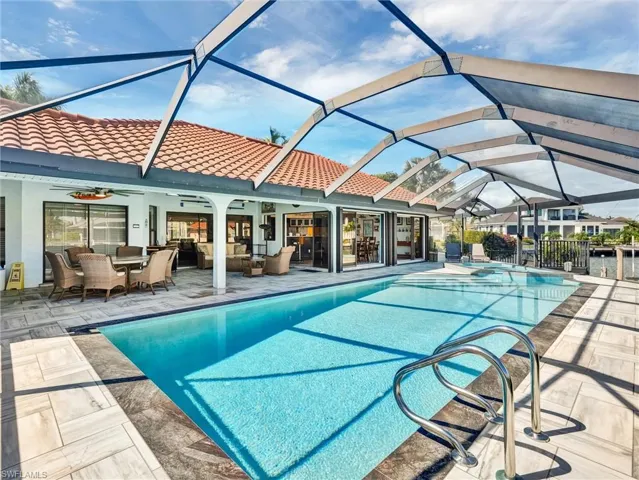 The huge lanai & pool area spans most of the rear of the home