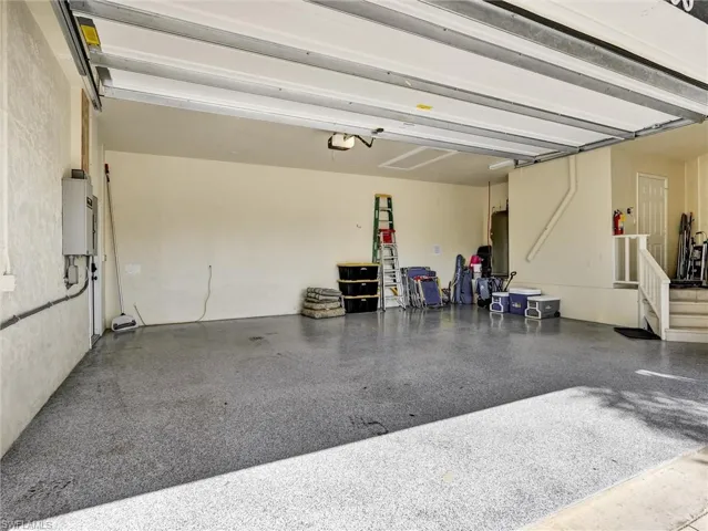 oversized two car garage with epoxy floor