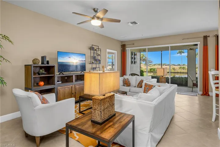 Great room with high ceilings, lots of natural light, and seamless indoor/outdoor living space.