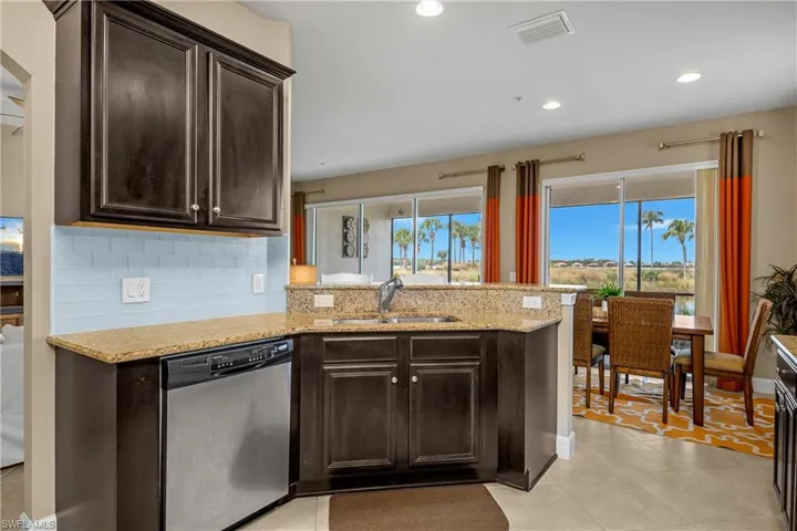 Open kitchen/dining/living area make this space perfect for entertaining guests.