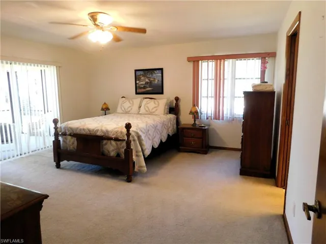 The master suite has a queen sized bed,walk in closet and sliding glass doors onto lanai