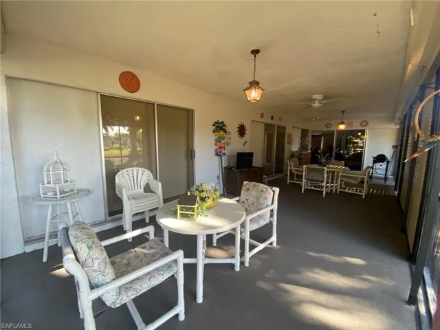 Large lanai has additional television and 2 seating areas, there are electric shutters you can adjust for privacy or shade.