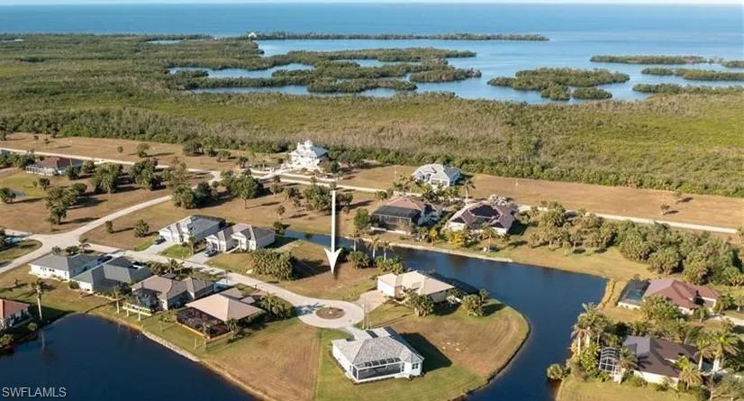 Aerial view of residential area with a nearby body of water