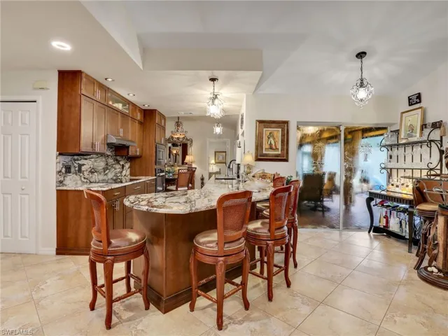 Large kitchen breakfast bar including all stools