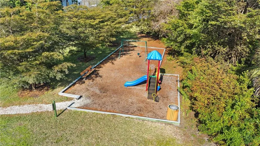 Drone / aerial view of a community park and a tree filled landscape