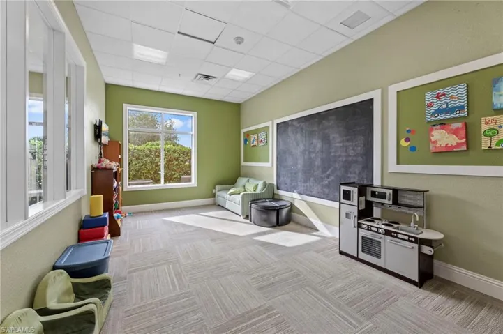 Recreation room with a drop ceiling