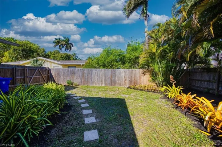 View of fenced backyard