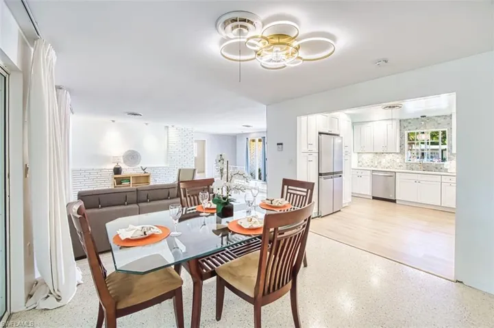 Dining space with terrazzo tile floor
