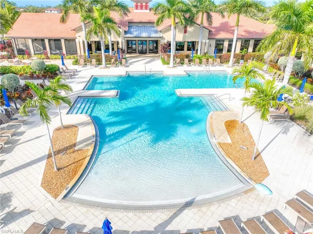 Community pool featuring a patio area