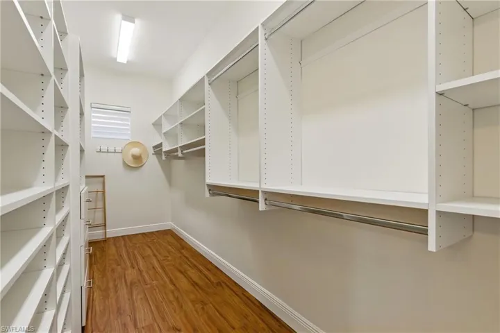 The primary walk in closet is larger than you think and offers a lot of storage options